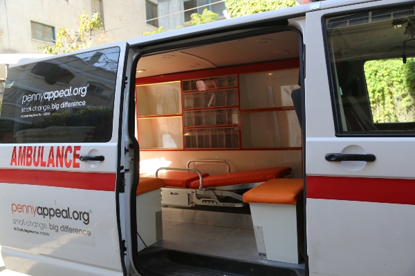 interior of a Penny Appeal branded ambulance.