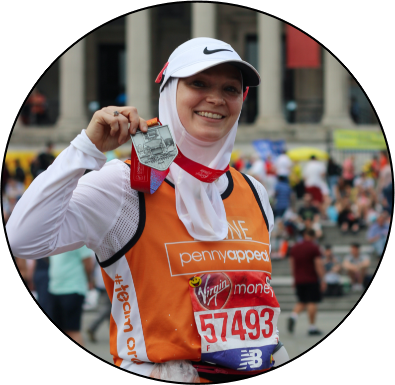 London Marathon 2020 Challenges Pennyappeal Org - lynne showing her medal