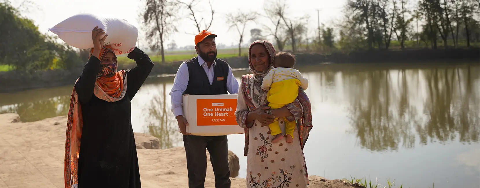 Food aid being delivered to a family through the Penny Appeal Fitrana programme.