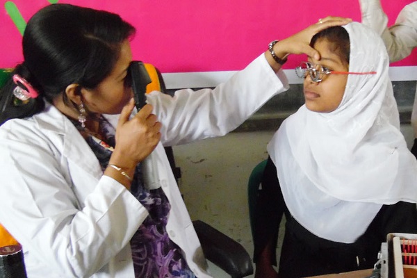 Eye test and healthcare, young girls eyesight